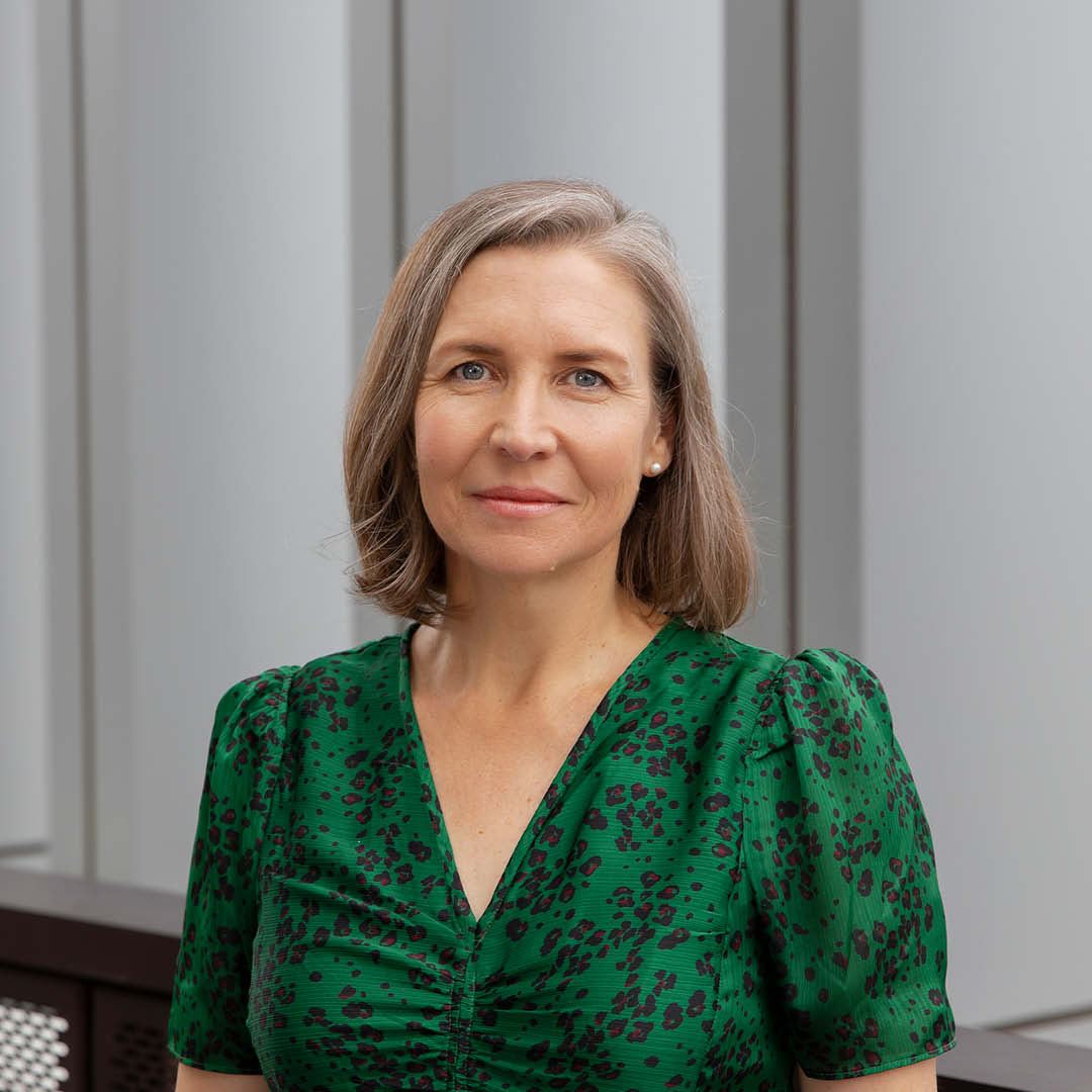 Woman in green top